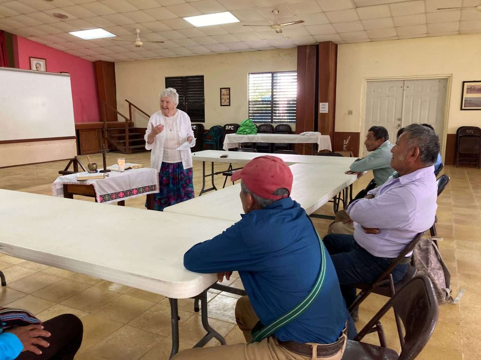 Sister Sharon meets with villagers